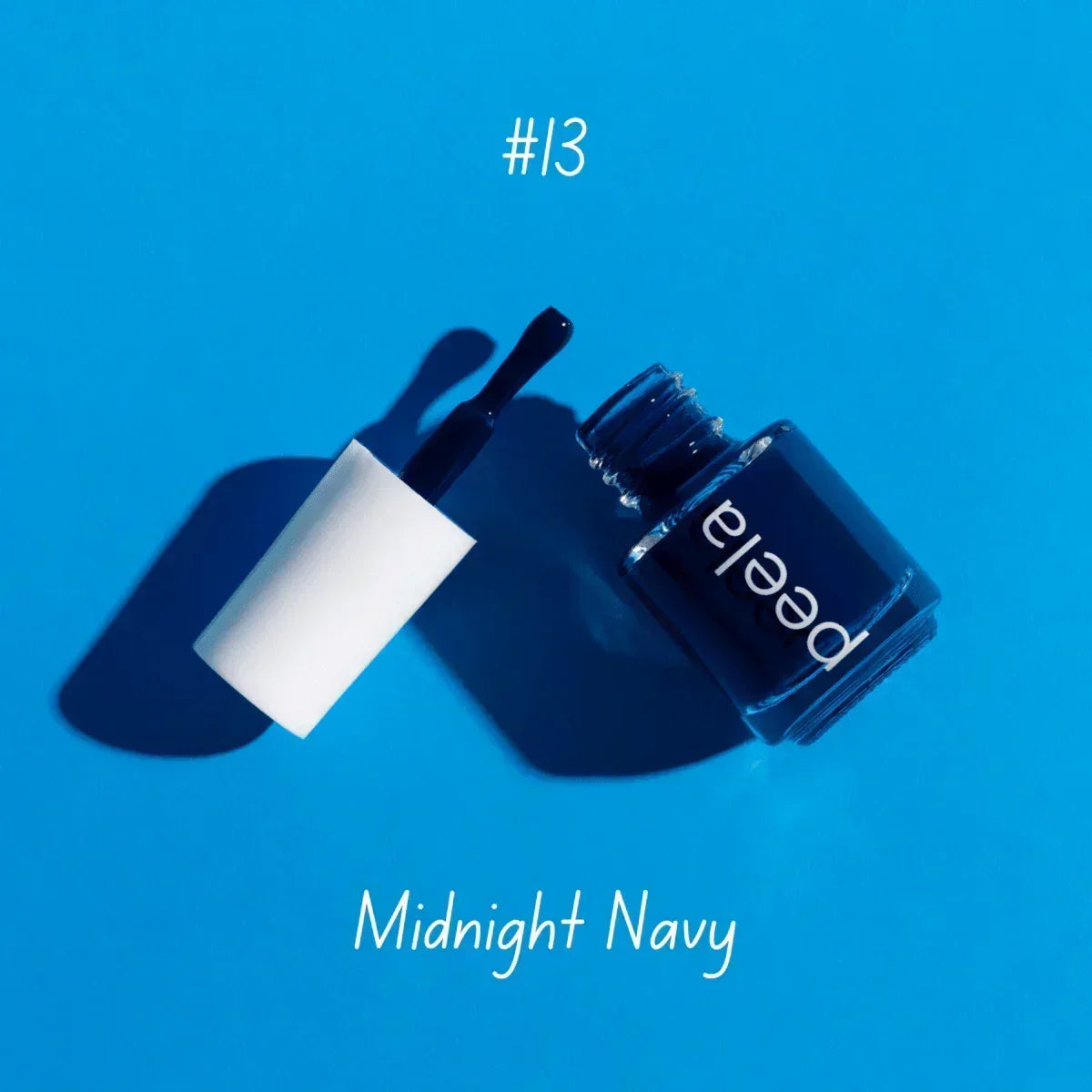 Peelable nail polish in Midnight Navy shade #13, safe and remover-free