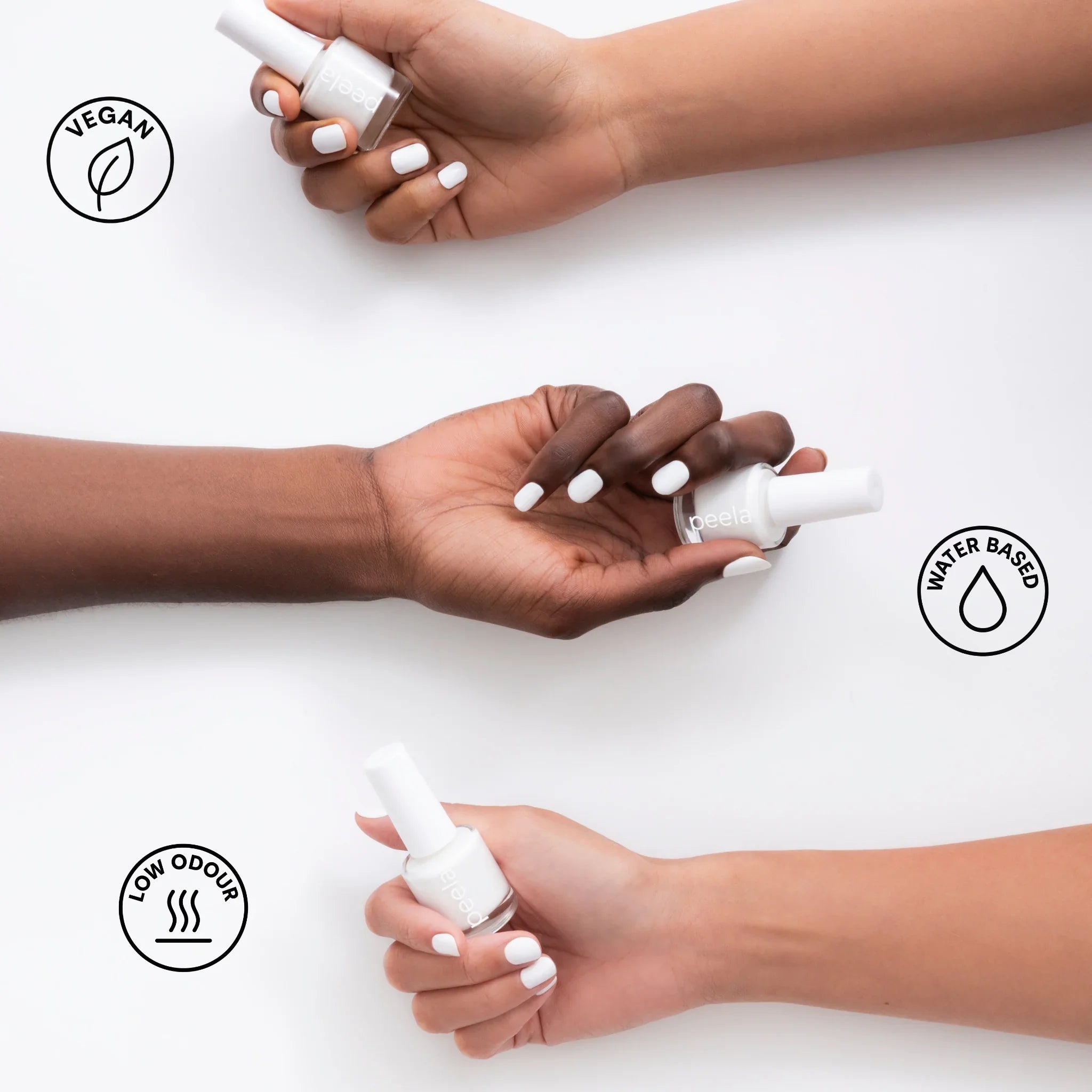 Peelanails Pure White peelable nail polish bottles shown on manicured hands with vegan, water-based, low-odour icons.