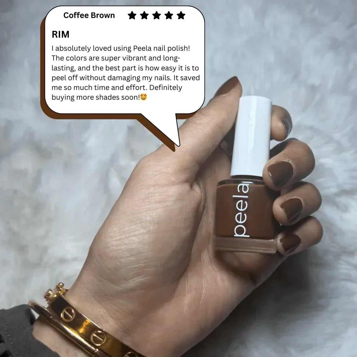Hand with Coffee Brown Peela peelable nail polish and matching manicured nails, product review bubble