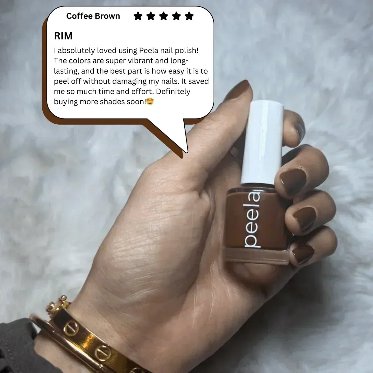 Coffee Brown peelable nail polish in hand, showcasing easy peel-off formula and vibrant color